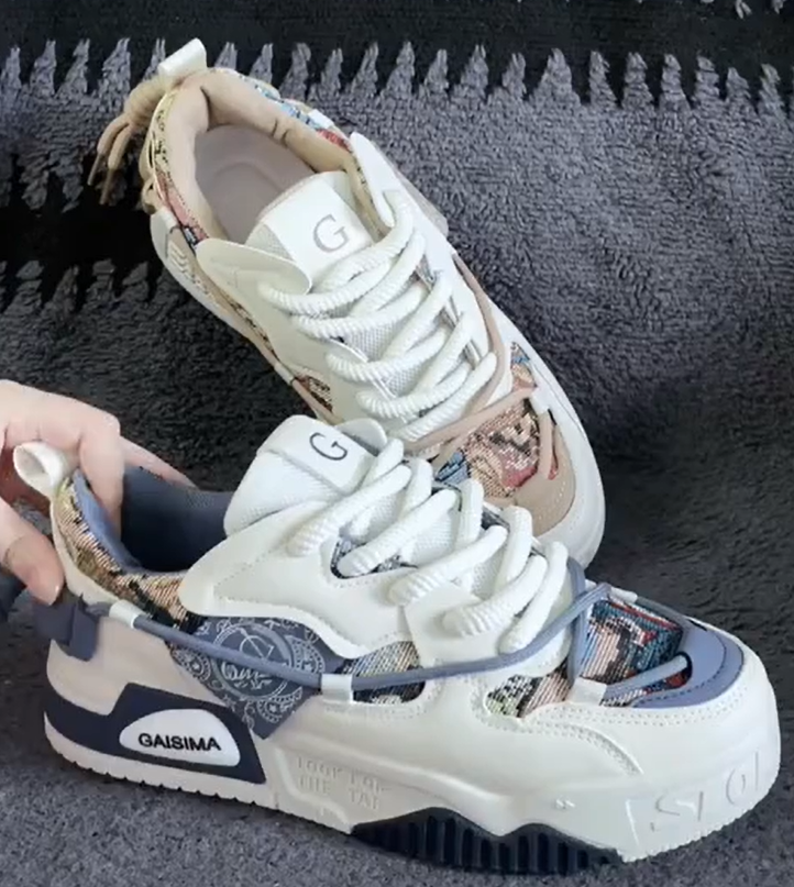 Sneakers blanches à empiècements tissés et semelle épaisse